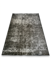 5' x 8' Rectangular Charcoal Ivory Distressed Abstract Modern Area Rug displayed on a white background, featuring a textured charcoal and ivory distressed abstract design.