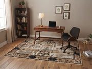5' x 8' Rectangular Ivory Beige & Black Distressed Tribal Floral Medallion Vintage Traditional Area Rug styled in a home office with a wooden desk and black office chair.
