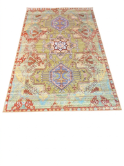 5' x 8' Rectangular Multicolor Distressed Tribal Geometric Vintage Washable Area Rug isolated on a white background.