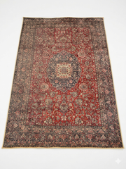5' x 8' Rectangular Red & Navy Floral Medallion Traditional Area Rug displayed on a plain background.