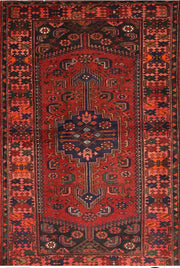 5' x 8' Rectangular Red & Navy Tribal Geometric Traditional Washable Area Rug isolated on a white background.