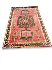 5' x 8' Red Brown Gold Vintage-Inspired Geometric Area Rug displayed on a light neutral background.
