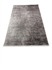 5' x 8' Textured Charcoal Gray Soft Black Neutral Area Rug displayed on a light neutral background.