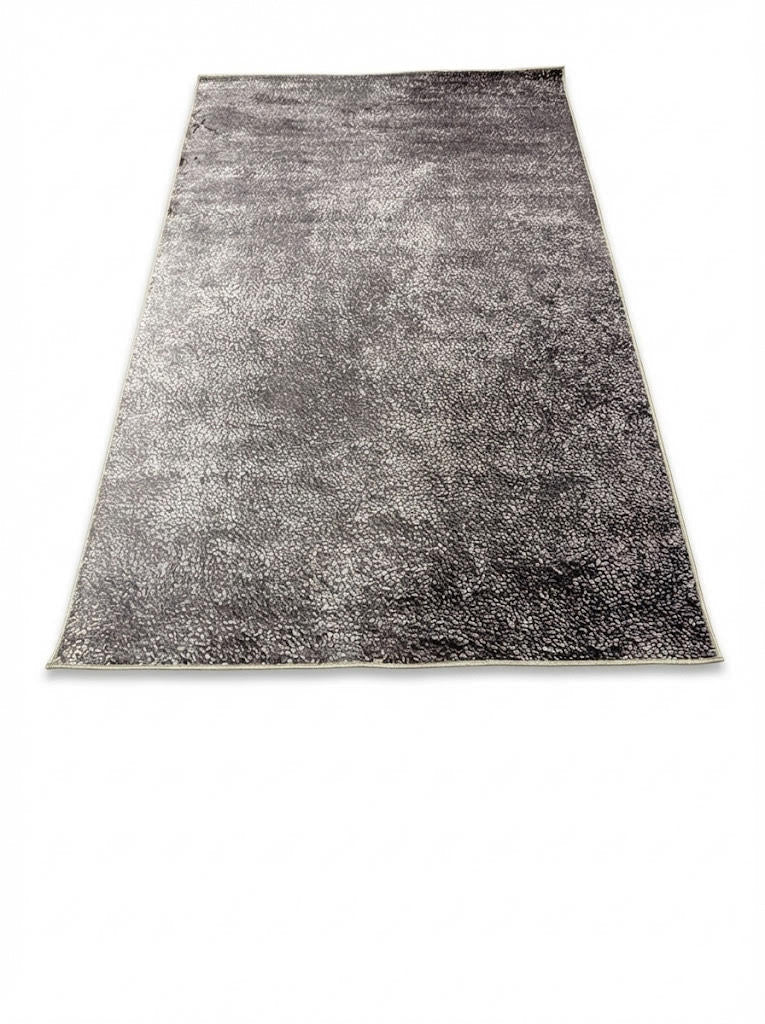 5' x 8' Textured Charcoal Gray Soft Black Neutral Area Rug displayed on a light neutral background.