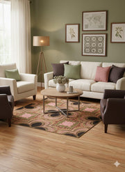 5' x 8' multi color geometric botanical area rug styled in a living room with neutral seating and sage green walls.