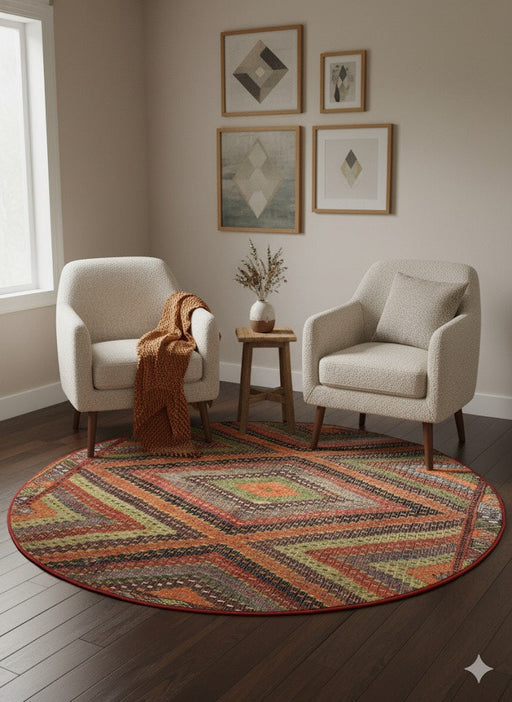 6' Round Multi Color & Rust Geometric Distressed Bohemian Area Rug styled in cozy living room seating area with accent chairs.