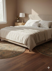 6' round beige teal & rust vintage medallion traditional area rug styled in an elegant bedroom with wood nightstands.