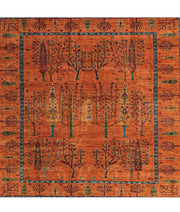 6' x 6' Square Rust Orange Multi Color Tree of Life Botanical Motif Tribal Area Rug top view displaying the intricate tree of life design and symmetrical botanical pattern.