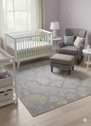 6' x 6' square blue, ivory, and gray tonal damask transitional area rug placed in a nursery with a crib, glider chair, and soft neutral decor.