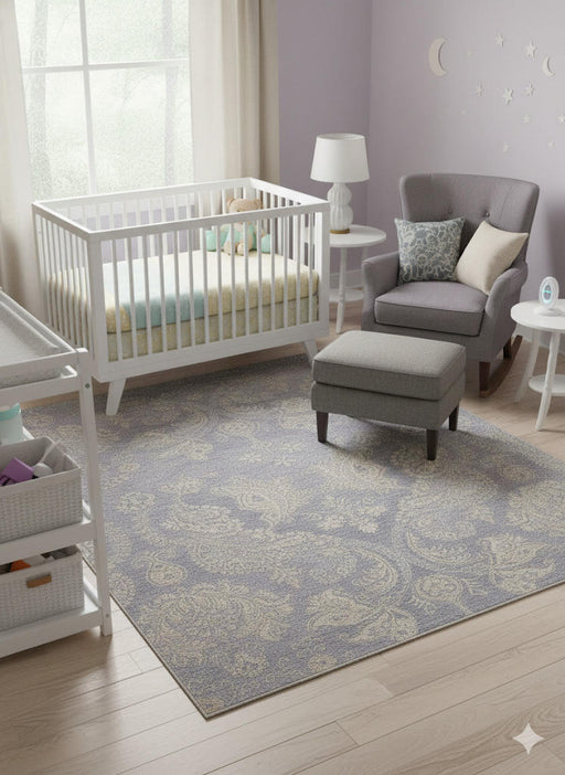 6' x 6' square blue, ivory, and gray tonal damask transitional area rug placed in a nursery with a crib, glider chair, and soft neutral decor.