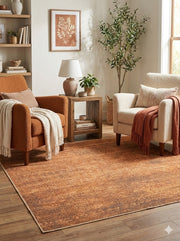 6' x 6' square brown & beige with subtle gray tones distressed modern washable area rug styled in cozy living room between accent chairs.