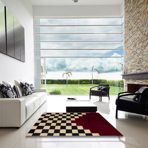 6' x 9' Abstract Dark Almond Brown Modern Area Rug displayed in a bright modern living room, showcasing the artistic abstract layout and contemporary appeal.