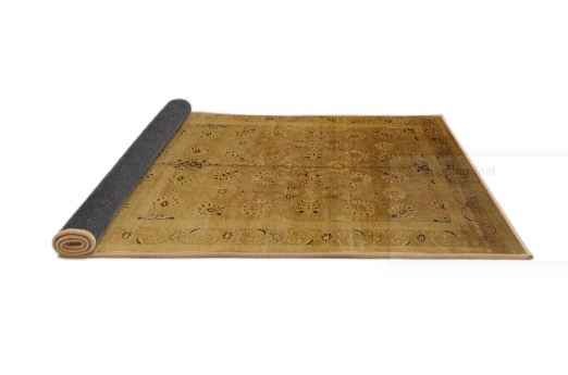 6' x 9' Dark Orange Soft Brown Mid-Century Modern Oriental Area Rug rolled corner view revealing the flexible backing and finished edges.