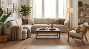 6' x 9' Rectangular Beige Brown Geometric Tribal Modern Washable Area Rug styled in a living room with a cream sectional sofa and wooden coffee table.
