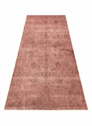6' x 9' Rectangular Dusty Rose & Soft Brown Distressed Solid Traditional Area Rug placed / styled on a clean white studio background.