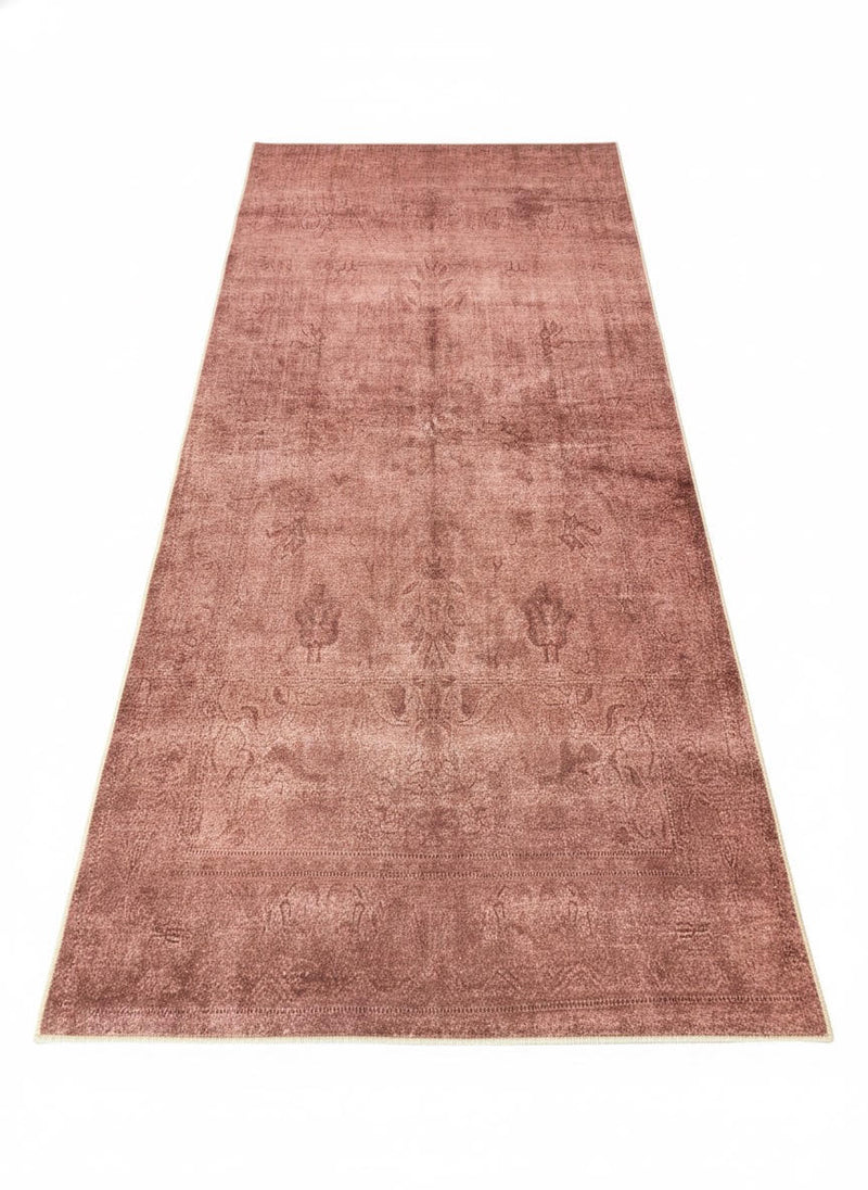 6' x 9' Rectangular Dusty Rose & Soft Brown Distressed Solid Traditional Area Rug placed / styled on a clean white studio background.