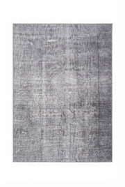 6' x 9' Rectangular Gray Silver Distressed Solid Modern Washable Area Rug featuring subtle faded textures and tonal gray variations, displayed in Product View.