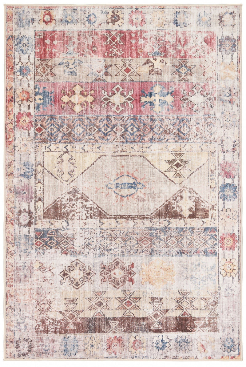 6' x 9' Rectangular Ivory Pink Distressed Geometric Tribal Bohemian Area Rug featuring faded pink and blue tribal motifs on an ivory background.