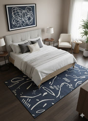 6' x 9' Rectangular Navy Blue & White Abstract Modern Area Rug placed in contemporary bedroom under bed.