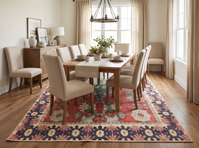 6' x 9' Rectangular Red Green Floral Medallion Traditional Area Rug styled in a dining room with a rectangular wooden dining table, cream upholstered chairs, and a wooden sideboard.
