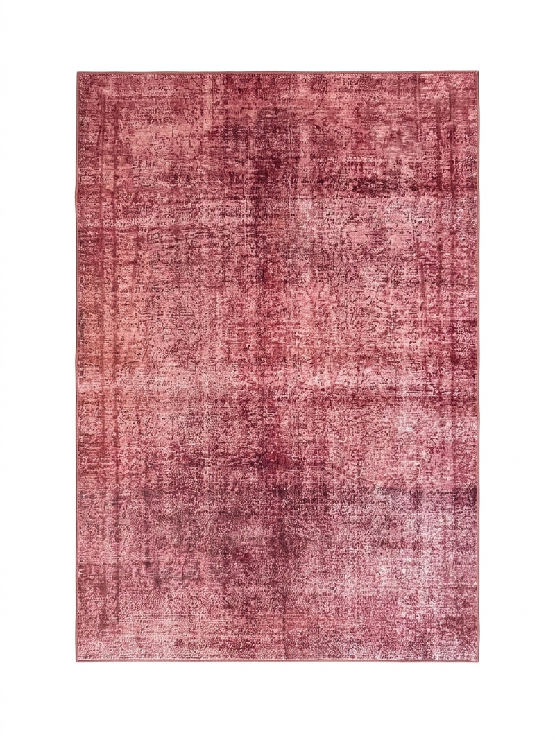 6' x 9' Rectangular Rose Pink Distressed Abstract Modern Area Rug isolated on a white background.