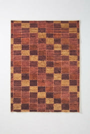 6' x 9' Rectangular Rust Gold Checkered Geometric Modern Washable Area Rug featuring alternating squares in warm earthy tones, displayed in Product View.