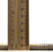 6' x 9' Red Mid-Century Modern Oriental Area Rug thickness measurement view showing the low-profile pile height beside a ruler for scale.