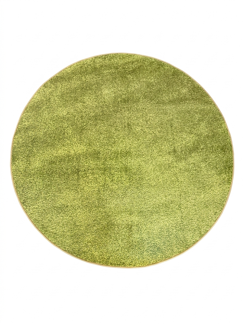 7 ft Round Green Solid Shag Modern Contemporary Area Rug isolated on a white background.