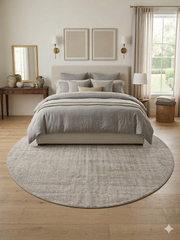 7 ft Round Ivory & Gray Textured Minimalist Modern Washable Area Rug styled in a serene modern bedroom.