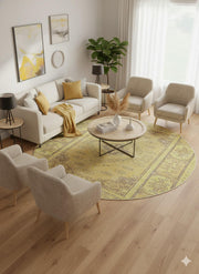 7' round soft yellow and faded olive washable vintage medallion area rug styled in a bright living room with a neutral sofa, light accent chairs, and warm mustard décor accents.