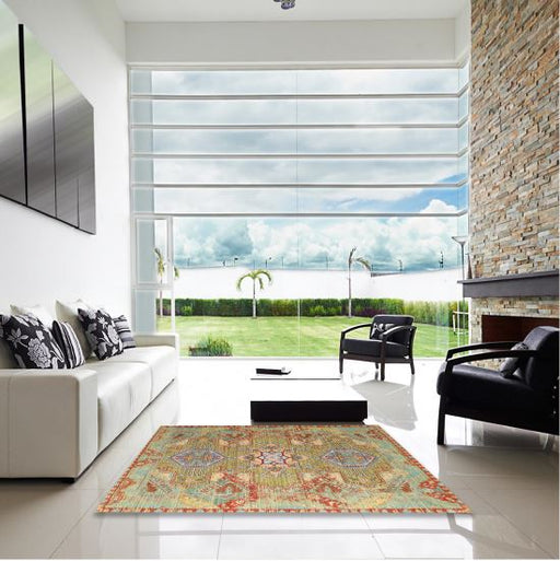 7' x 10' Green Multi-Color Tribal Medallion Traditional Persian Rug styled in a bright living room, demonstrating how the rich colors complement modern interiors.