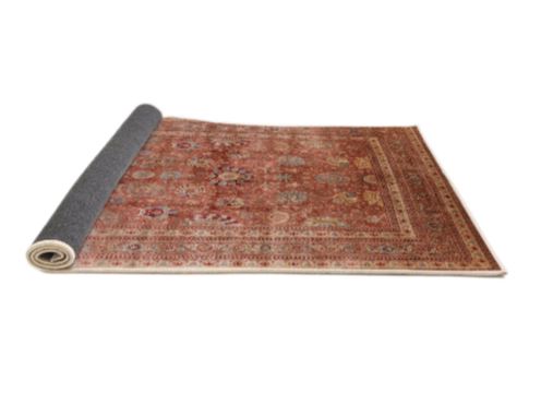 7' x 10' Mid-Century Modern Sunrise Orange Oriental Area Rug styled in a modern bedroom setting, emphasizing the rich orange hues and elegant vintage-inspired pattern.