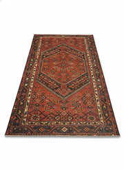 7' x 10' Rectangular Deep Brick Red & Multi Color Traditional Medallion Washable Area Rug displayed alone in a full flat lay view highlighting its intricate medallion and detailed border pattern.