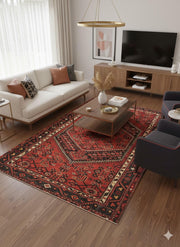 7' x 10' Rectangular Deep Brick Red & Multi Color Traditional Medallion Washable Area Rug placed in a modern living room with a neutral sofa, wood coffee table, and mid-century accents.