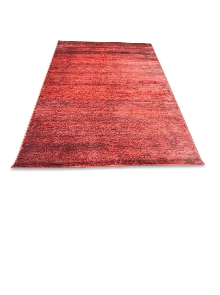 7' x 10' rectangular area rug featuring a distressed vintage design in red, burgundy, and subtle brown tones for a warm farmhouse aesthetic.
