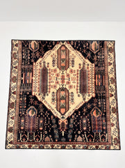 7' x 7' Square Black & Ivory Rust Tribal Geometric Medallion Traditional Area Rug featuring a large ivory central medallion, rust tribal motifs, and decorative geometric borders.