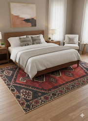 7' x 7' Square Burgundy Charcoal Black Geometric Tribal Area Rug placed in a bedroom setting highlighting the striking geometric motifs and decorative tribal border.