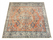 7' x 7' Square Coral Blue Distressed Floral Vintage Area Rug isolated on a white background.