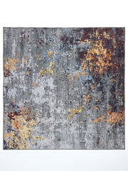 7' x 7' Square Gray Gold & Rust Distressed Abstract Modern Washable Area Rug featuring a textured gray background with scattered gold, rust orange, and charcoal abstract accents.