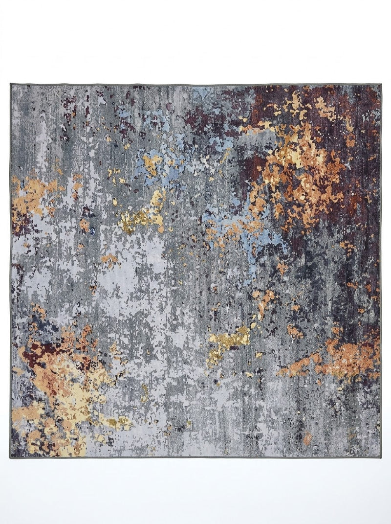 7' x 7' Square Gray Gold & Rust Distressed Abstract Modern Washable Area Rug featuring a textured gray background with scattered gold, rust orange, and charcoal abstract accents.