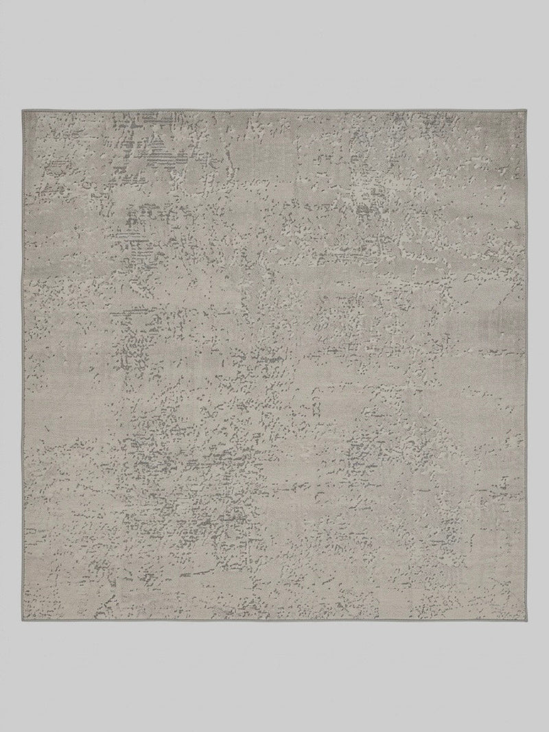 7' x 7' Square Ivory Gray Distressed Abstract Modern Area Rug isolated on a white background.