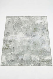 7' x 7' Square Light Gray & Sage Green Distressed Abstract Modern Washable Area Rug featuring a soft mottled texture with sage green, ivory, and gray tones.