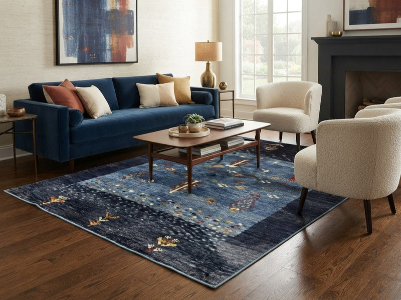7' x 7' Square Navy Blue & Multicolor Tribal Geometric Southwestern Area Rug styled in a living room with a navy blue sofa, cream accent chairs, and wooden coffee table.