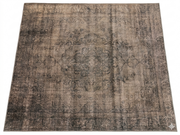 7' x 7' Square Taupe Gray Distressed Medallion Vintage Area Rug displayed on a white background, showcasing its faded taupe and gray medallion design with a vintage-inspired distressed pattern.