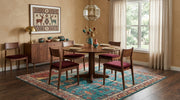 7' x 7' Square Teal Red & Ivory Tree of Life Pictorial Traditional Area Rug styled in a dining room beneath a round wooden dining table and burgundy upholstered chairs.