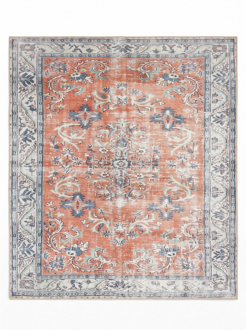 7' x 7' Square Terracotta & Blue Distressed Floral Medallion Vintage Area Rug featuring intricate floral motifs, an ivory ornamental border, and a faded Persian-inspired design.