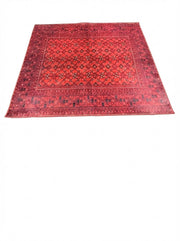 7' x 7' square area rug featuring a deep red base with navy blue oriental traditional pattern.