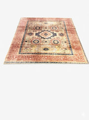 7' x 7' square area rug featuring a distressed traditional medallion pattern with warm multi-color tones.