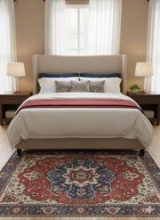 7' x 7' square multi-color medallion traditional area rug styled beneath a bed with neutral bedding and classic wood nightstands.