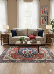 7' x 7' square red blue and ivory medallion traditional area rug placed in a cozy living room with a neutral sofa, wood coffee table, and warm decor.